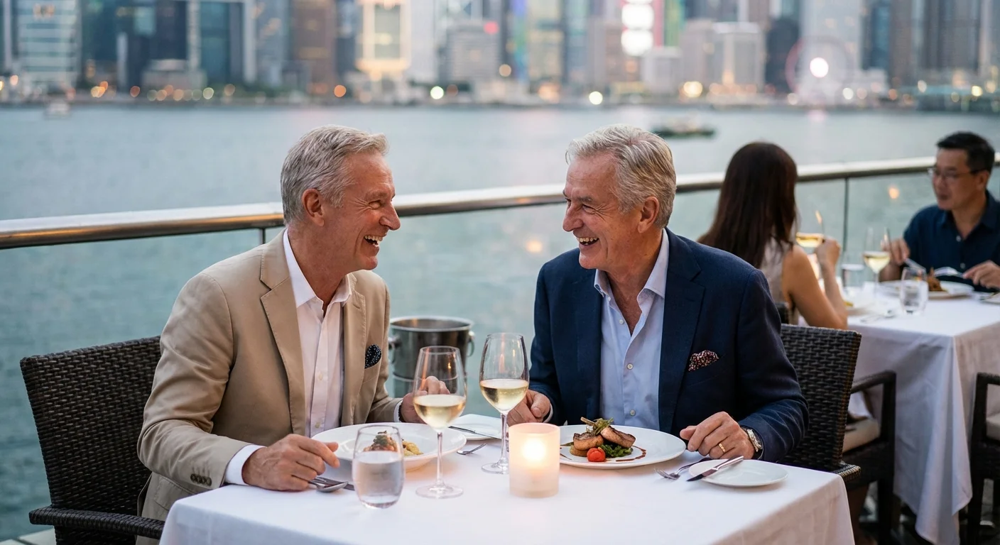 A senior couple enjoying a luxury dinner together by the water.
